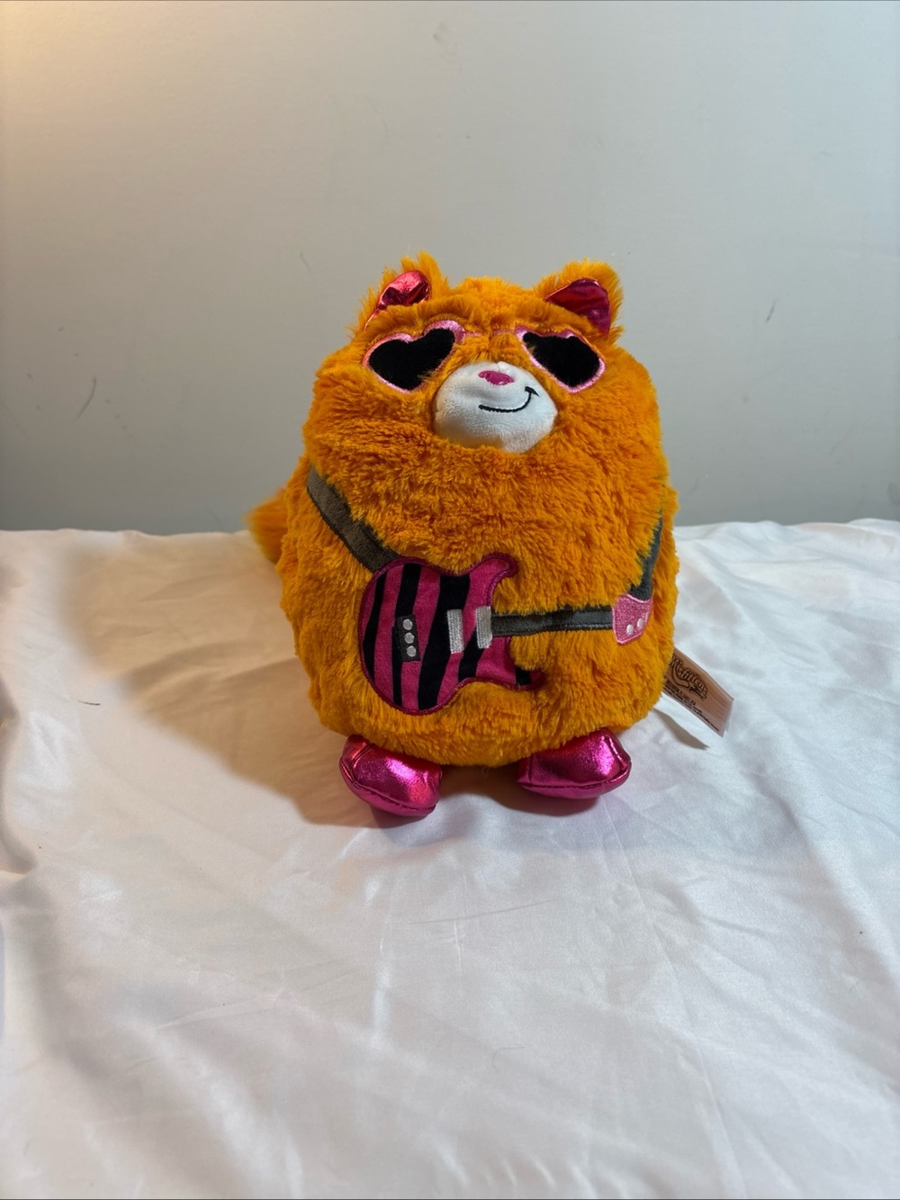 Mattel Orange Plush Cat with Pink Metallic Feet and Pink Guitar Detail